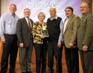 From left, Martin Hall, campus director of BV of OKC, Thomas, Sara Flaming, Ken Flaming, Pierce, Wendell Short, BVC vice president of planning and project mgmt.