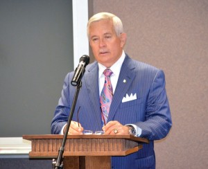 Gene Downing presents a motion, as chairman of the Falls Creek building committee, to the BGCO Board of Directors.