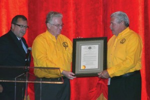 From left, Rep. Mark McBride, R-Moore, presents a citation from the Oklahoma State House of Representatives praising Oklahoma Baptist Disaster Relief for its role in the Moore tornado recovery.