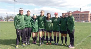OBU Women’s Soccer Coach Michael White, left, poses with his players who are participating in a pre-World Cup ministry trip in Brazil.