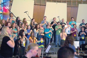Resonate choir, the high school choir, practices in Potter Auditorium in Raley Chapel before their performance Sat., June 28.