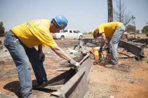 Oklahoma Baptist Disaster Relief teams clear debris at home sites in Guthrie on Wednesday. (Photo: Jonathan Burkhart)